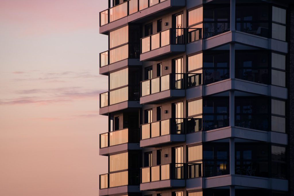 Modern apartment building with glass balconies